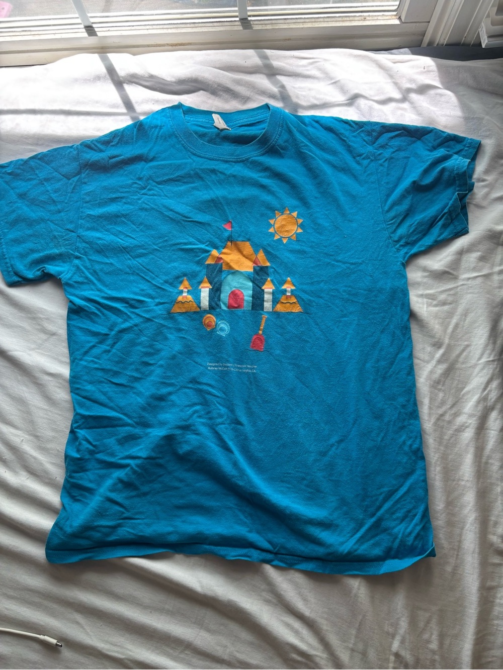 H&M Teal Graphic Tee with Beach Castle Motif